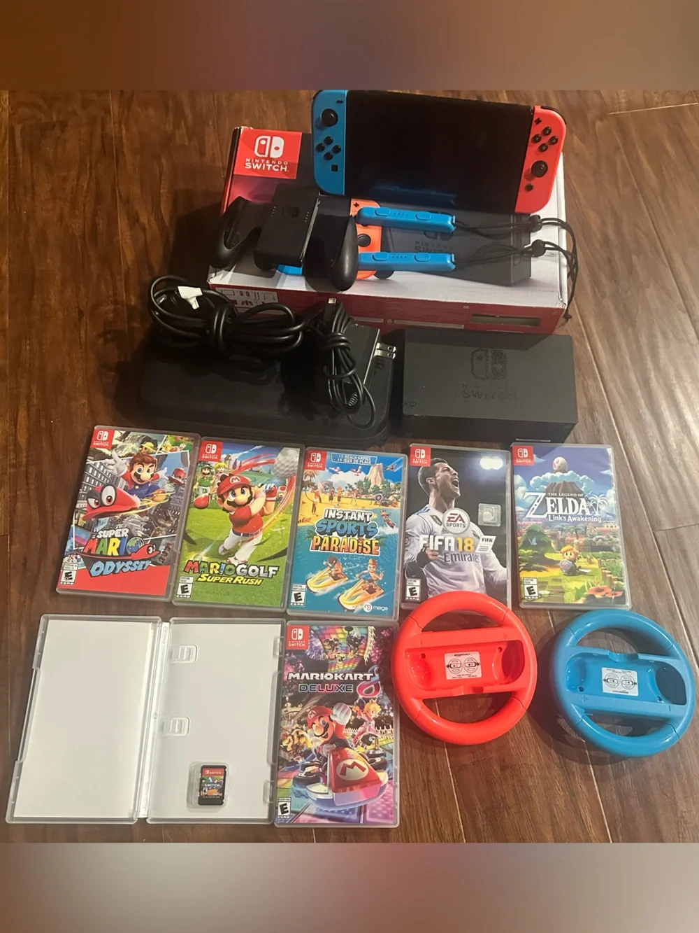 Nintendo Switch with Red and Blue Joy-Con, Racing Wheels & Games